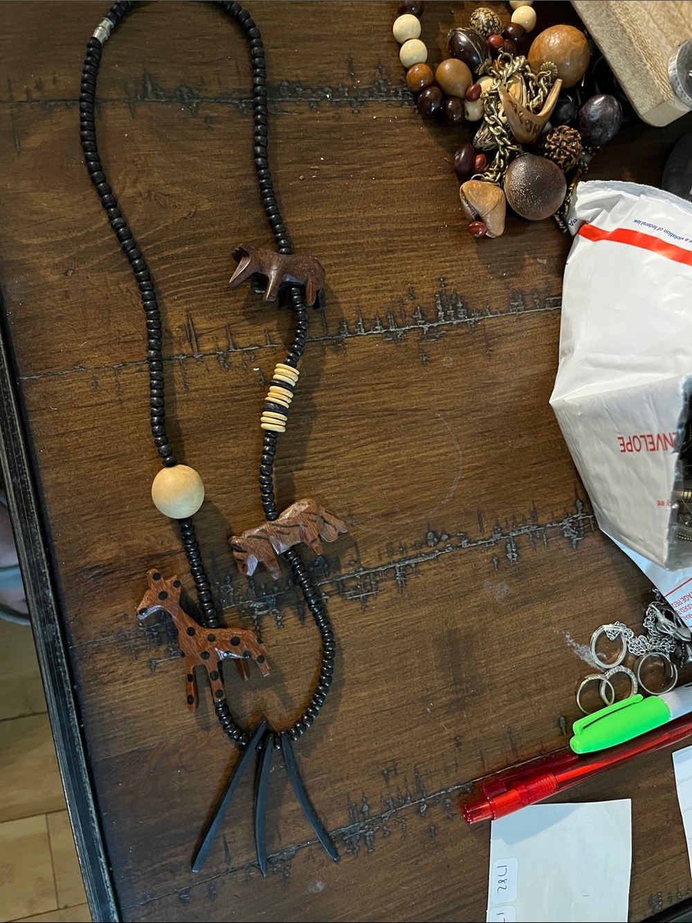 Wooden carved animal necklace